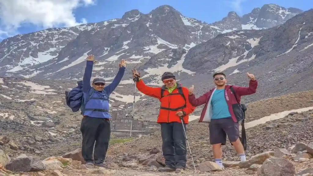 Mount Toubkal trek Imlil village Morocco highest peak in North Africa Mount Toubkal altitude how to get to Imlil from Marrakech Mount Toubkal 2 day trek Mount Toubkal 3 day trek Toubkal National Park Morocco Mount Toubkal difficulty Toubkal refuge altitude Sidi Chamharouch Morocco Mount Toubkal best time to visit Mount Toubkal packing list do I need a guide for Mount Toubkal Atlas Mountains trekking Morocco Mount Toubkal altitude sickness Mount Toubkal cost