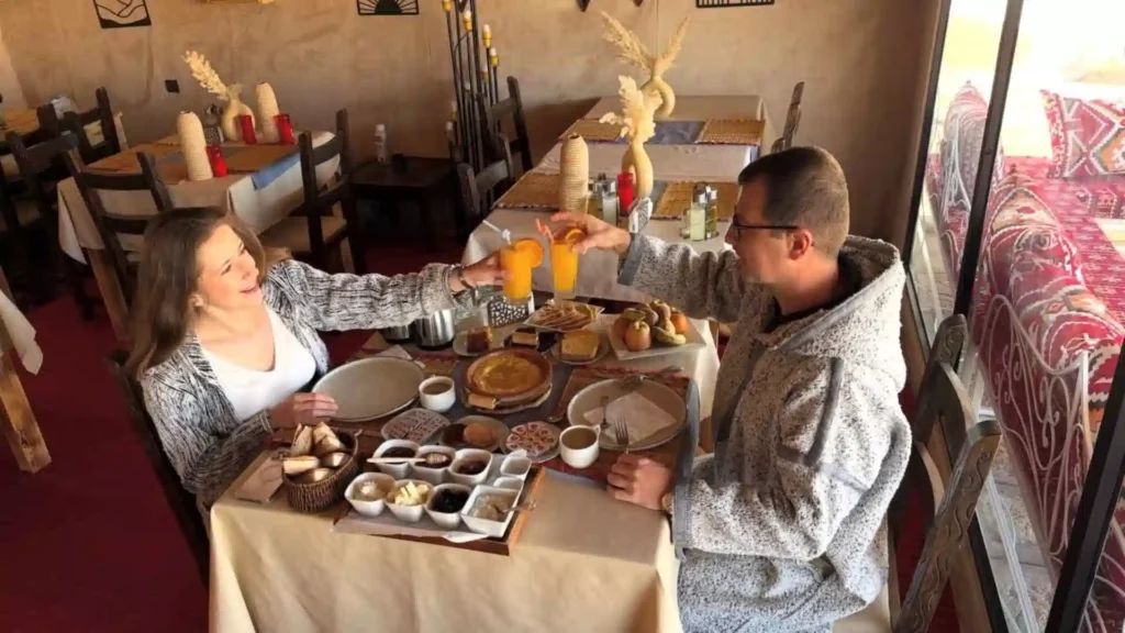 Breakfast at Over Morocco Tours' luxury desert camp Morocco, Erg Chebbi glamping camp, Merzouga Sahara

sleeping in the Sahara Desert