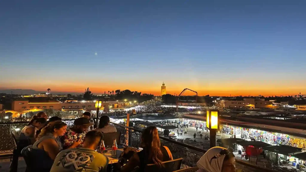 Djemaa el-Fna square at dusk Marrakech — food stalls and evening atmosphere, Over Morocco Tours Morocco guide 2026
