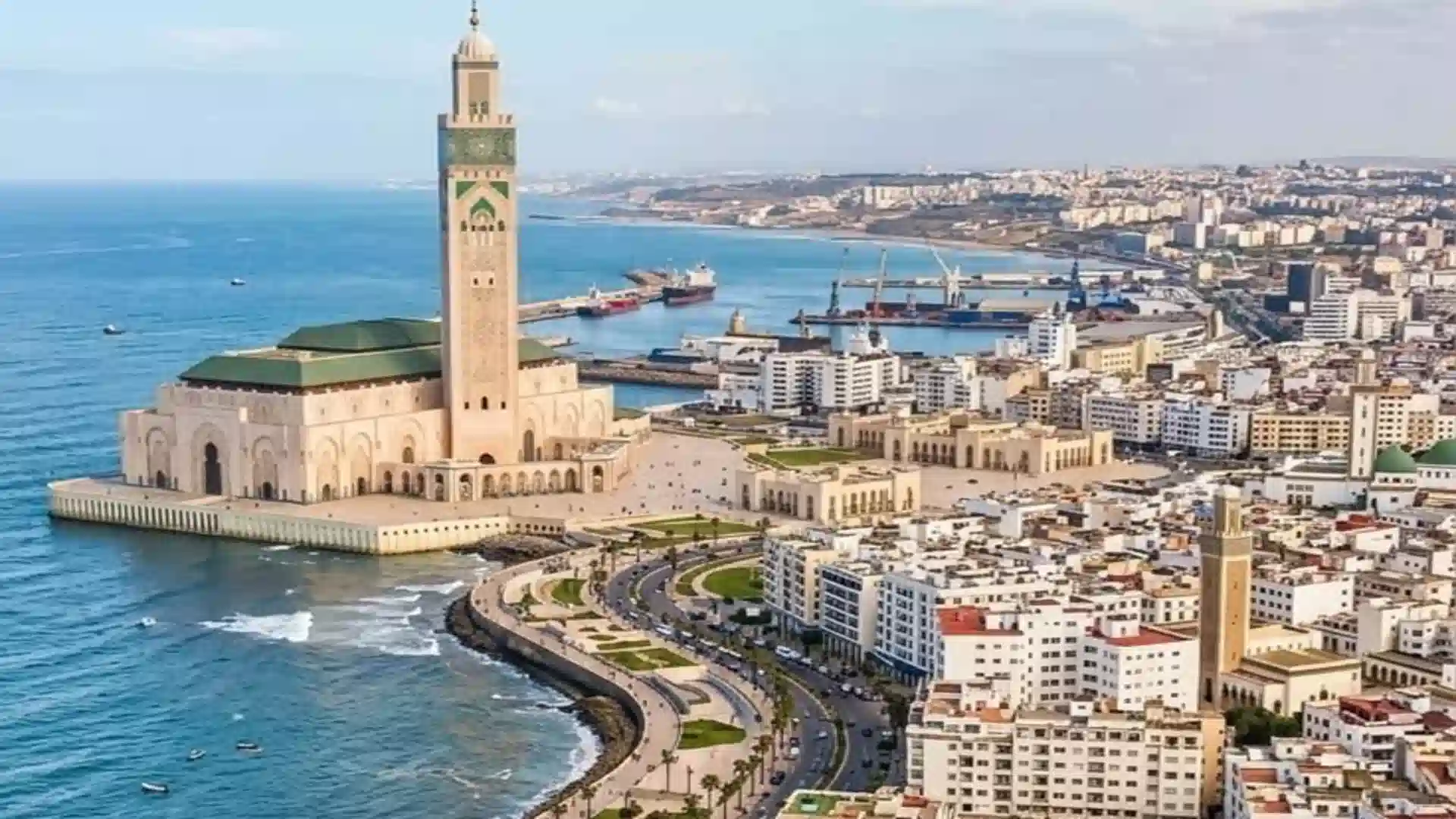 is marrakech or casablanca more beautiful - aerial view of Hassan II Mosque on the Casablanca coastline