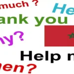 Colorful English phrases next to the national flag highlighting basic communication needs for what language is spoken in Morocco.