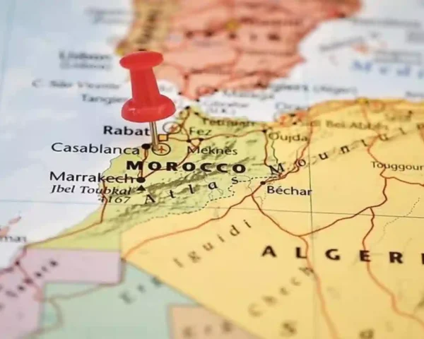 A red pushpin placed directly over Rabat to highlight where is Morocco in Africa on a physical map.